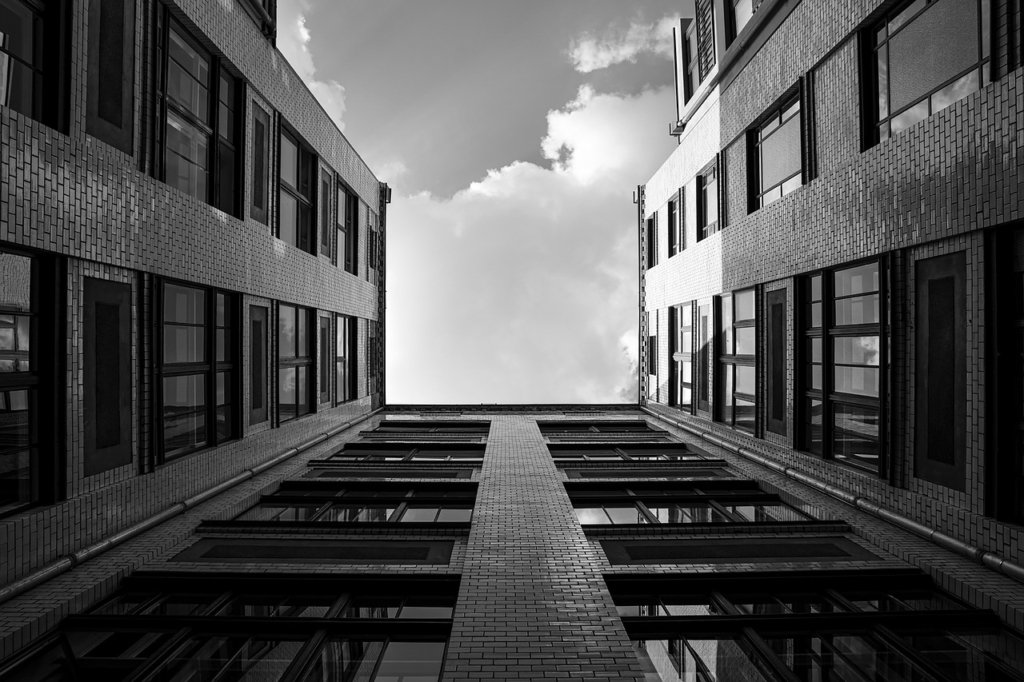 High-rise buildings in Konkan real estate project with modern architecture and sky view.
